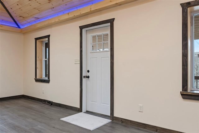 property entrance with stucco siding