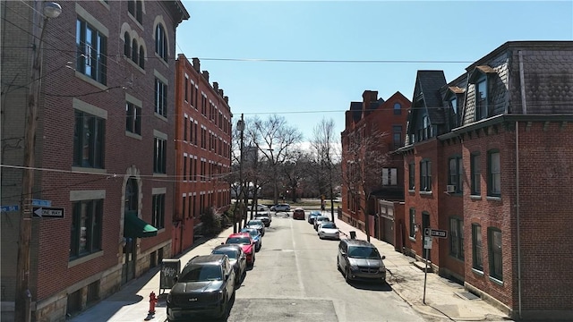 view of road featuring curbs and sidewalks