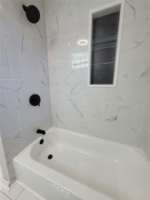 bathroom with shower / bath combination