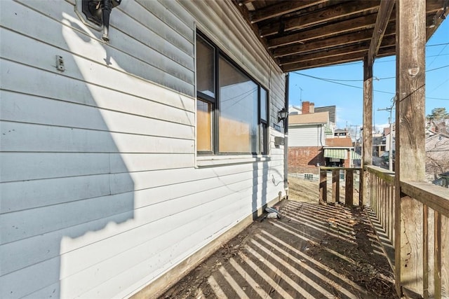 view of side of property featuring a balcony