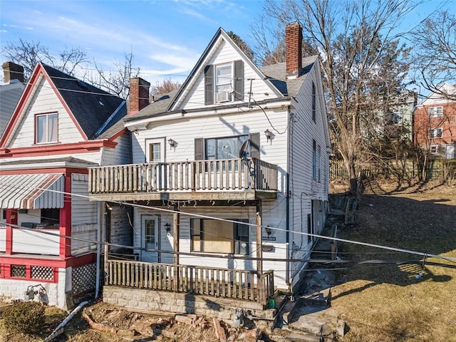 view of front of property featuring a chimney