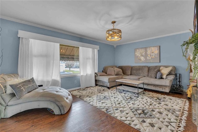 living room featuring ornamental molding and wood-type flooring