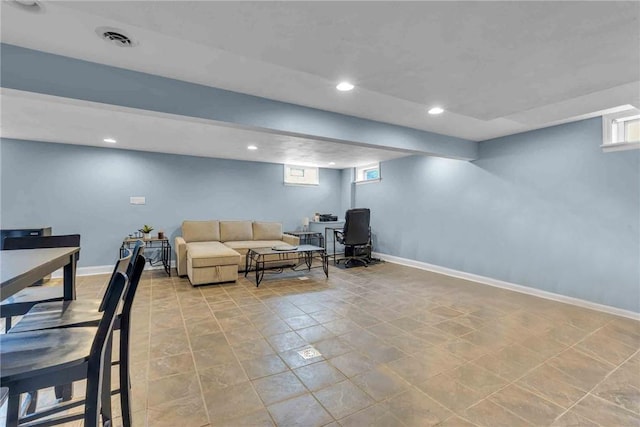 living room featuring recessed lighting, visible vents, and baseboards