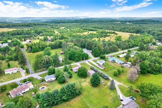 aerial view featuring a forest view