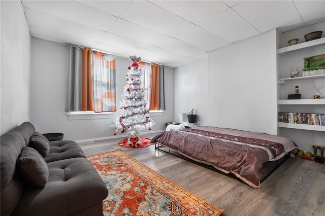 bedroom with wood finished floors