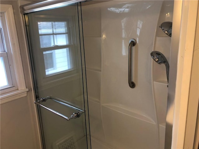 full bathroom with a stall shower