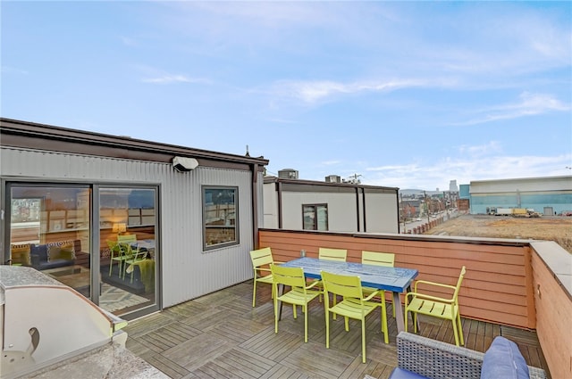 balcony with outdoor dining area