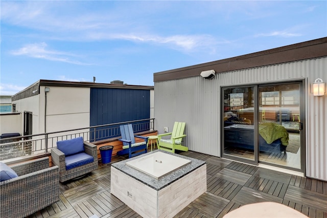 wooden terrace featuring outdoor lounge area