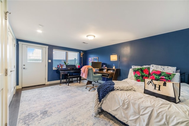 bedroom featuring baseboards