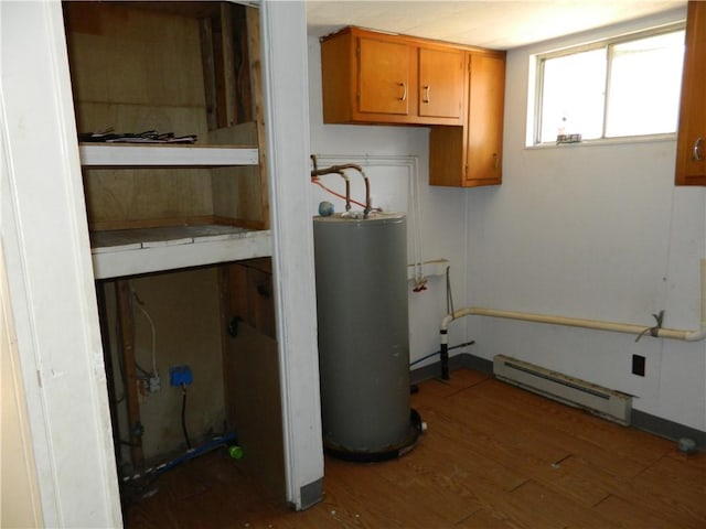 utility room featuring a baseboard heating unit and water heater