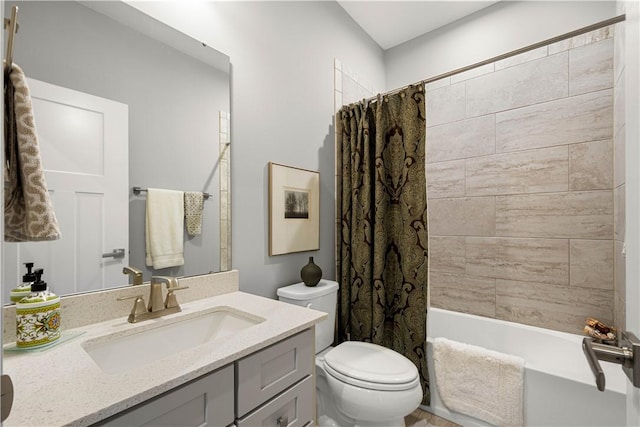 full bathroom featuring toilet, shower / bathtub combination with curtain, and vanity