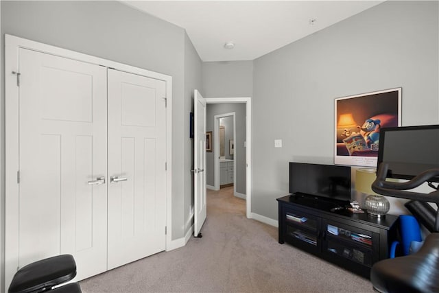 interior space featuring carpet floors and baseboards