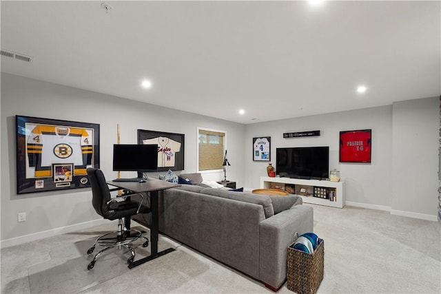 living area featuring recessed lighting, visible vents, and baseboards