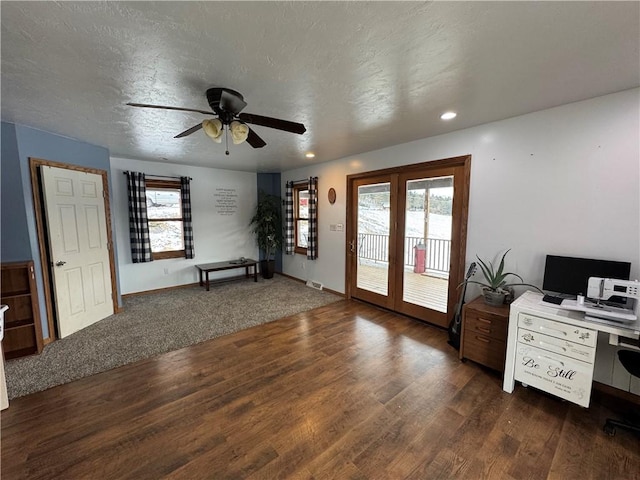 interior space with visible vents, ceiling fan, recessed lighting, wood finished floors, and a textured ceiling