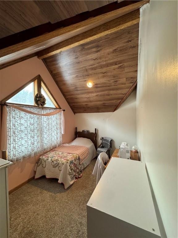 carpeted bedroom featuring lofted ceiling with beams and wooden ceiling