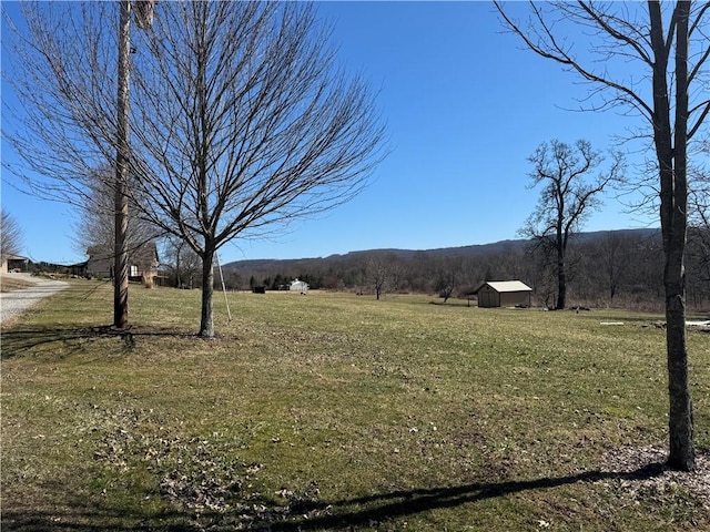 property view of mountains featuring a rural view