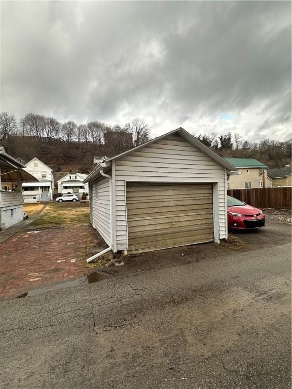 detached garage with fence