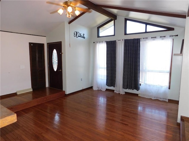 entryway featuring vaulted ceiling with beams, hardwood / wood-style floors, plenty of natural light, and a ceiling fan