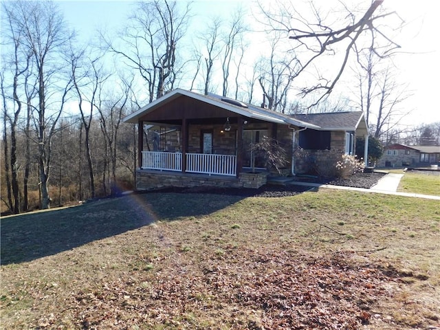 view of front of house featuring a porch and a front yard