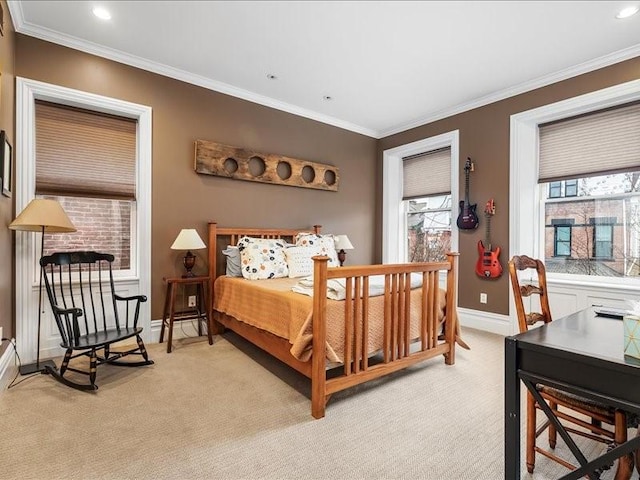 bedroom featuring ornamental molding and light carpet