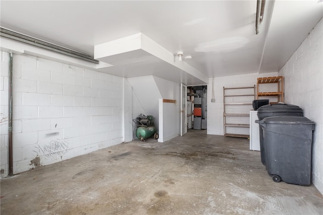 garage featuring concrete block wall