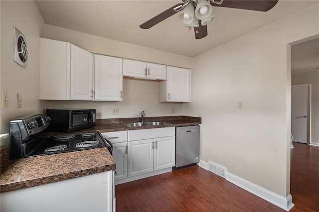 kitchen featuring visible vents, electric stove, a sink, black microwave, and stainless steel dishwasher