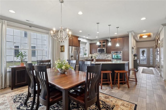 dining area with visible vents, recessed lighting, and ornamental molding