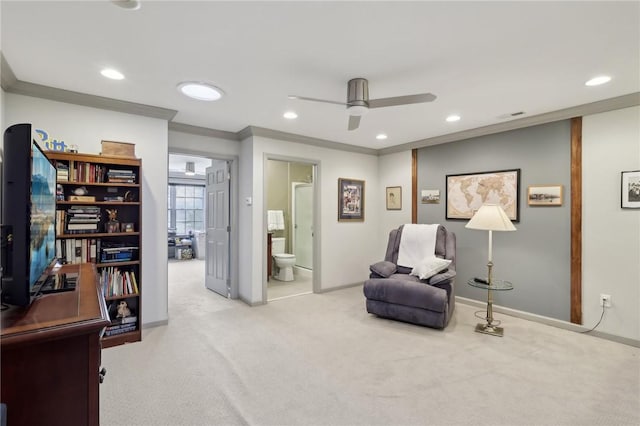 sitting room featuring ceiling fan, carpet flooring, recessed lighting, and ornamental molding