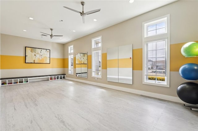 workout room with a wealth of natural light, baseboards, ceiling fan, and recessed lighting