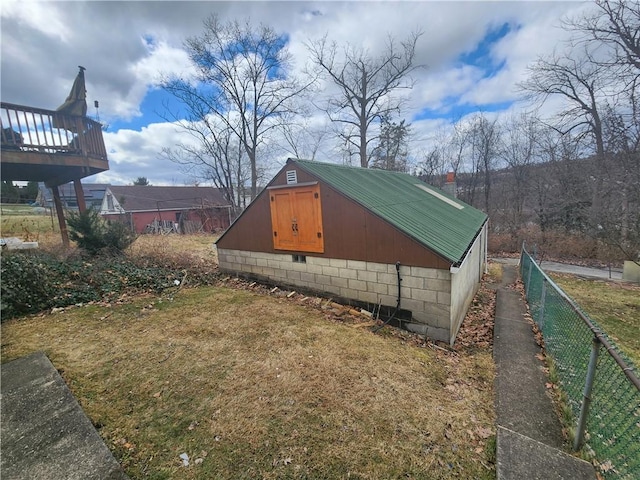 view of outdoor structure with fence