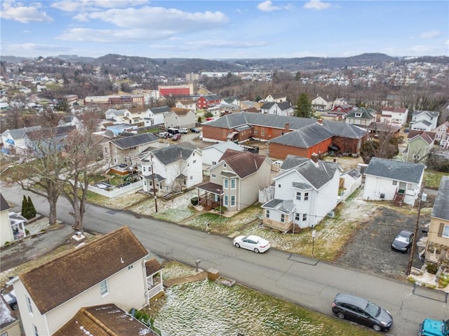 birds eye view of property with a residential view