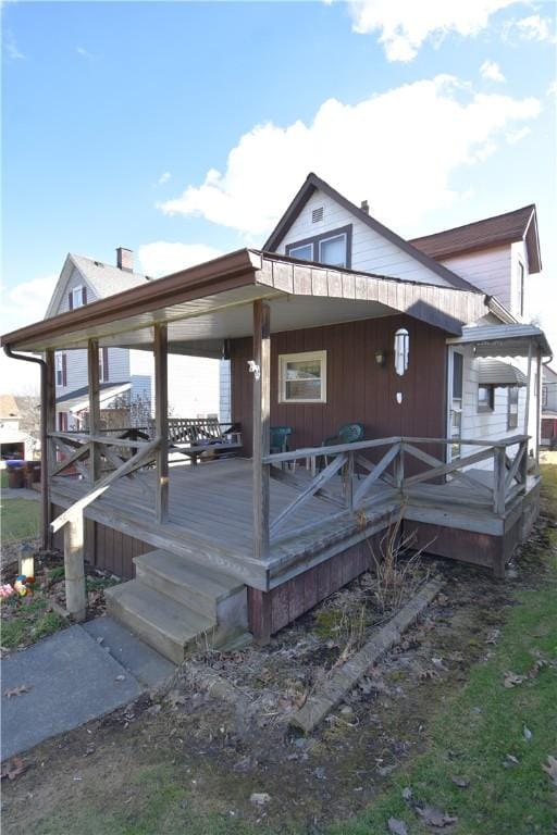 exterior space featuring a wooden deck