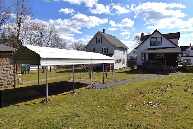 view of yard featuring a detached carport