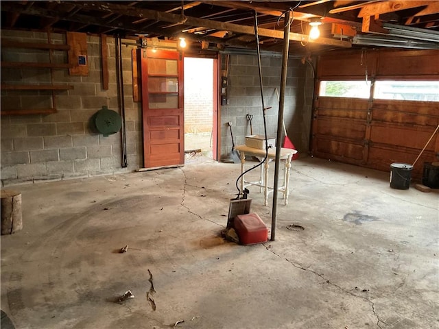 garage featuring concrete block wall