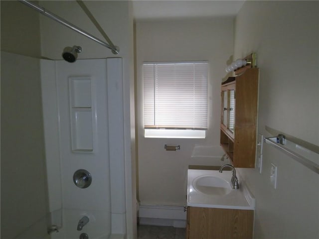 bathroom with vanity and bathtub / shower combination