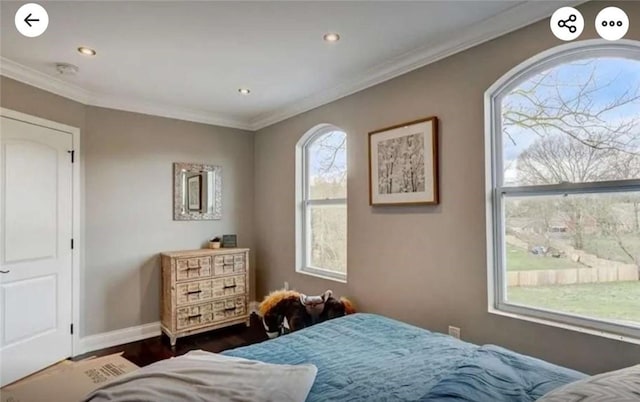 bedroom featuring dark wood-style floors, recessed lighting, crown molding, and baseboards