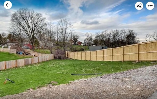 view of yard with fence