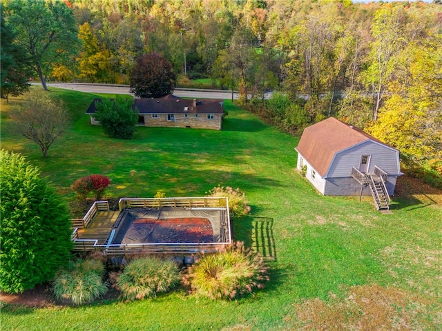 bird's eye view featuring a forest view