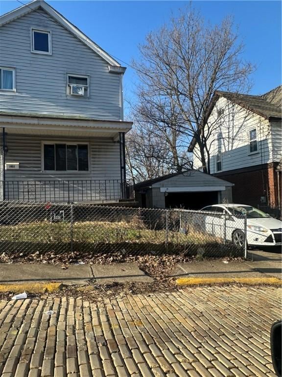 view of home's exterior with a fenced front yard