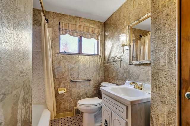 bathroom featuring visible vents, toilet, and vanity