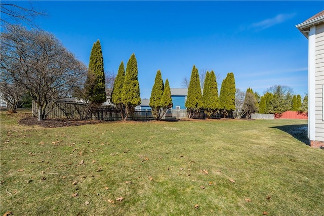 view of yard featuring fence