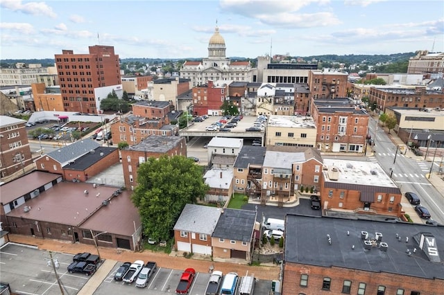 birds eye view of property with a view of city