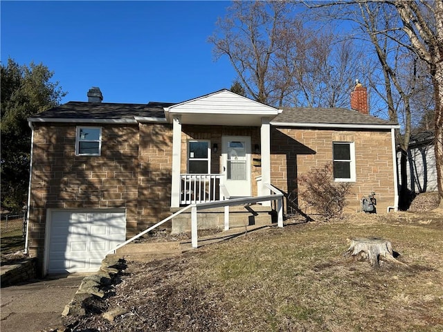 view of front of house featuring a porch, an attached garage, a chimney, and a shingled roof