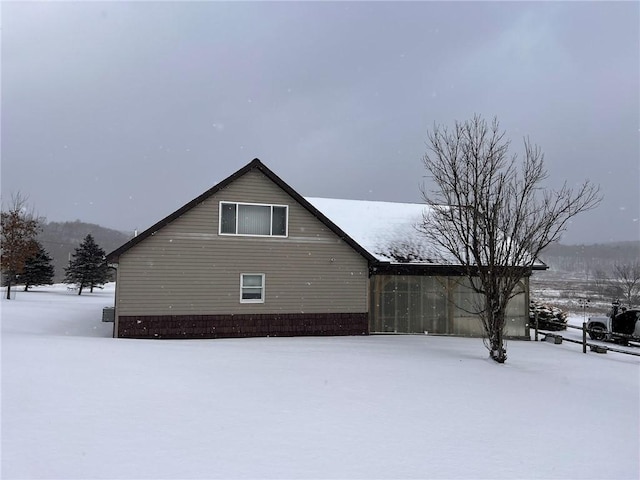 view of snow covered property