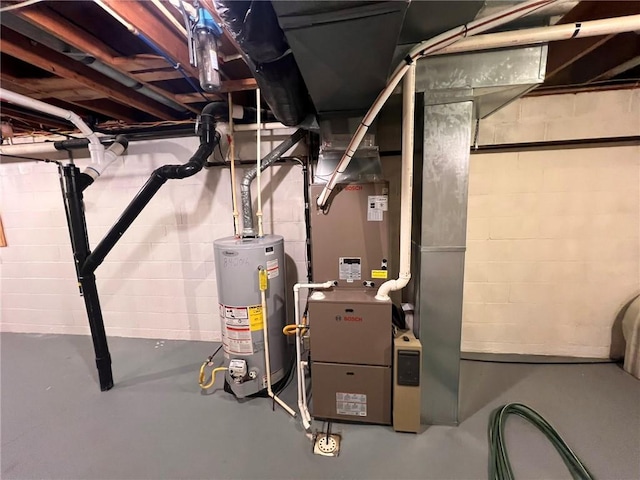 utility room with gas water heater