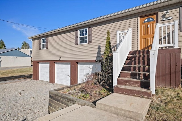 view of front of house featuring driveway and an attached garage