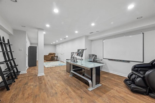 home office with recessed lighting, baseboards, and wood finished floors