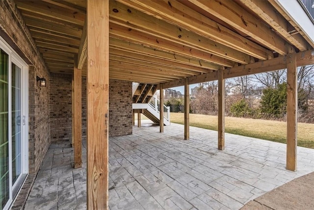 view of patio featuring stairs