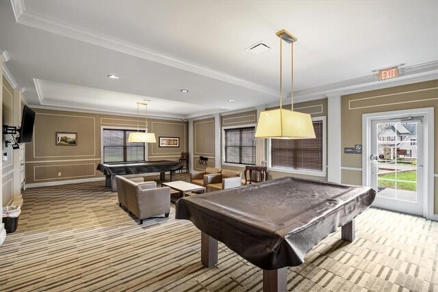 playroom featuring light colored carpet, crown molding, pool table, and a decorative wall