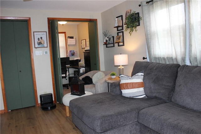 living room with wood finished floors